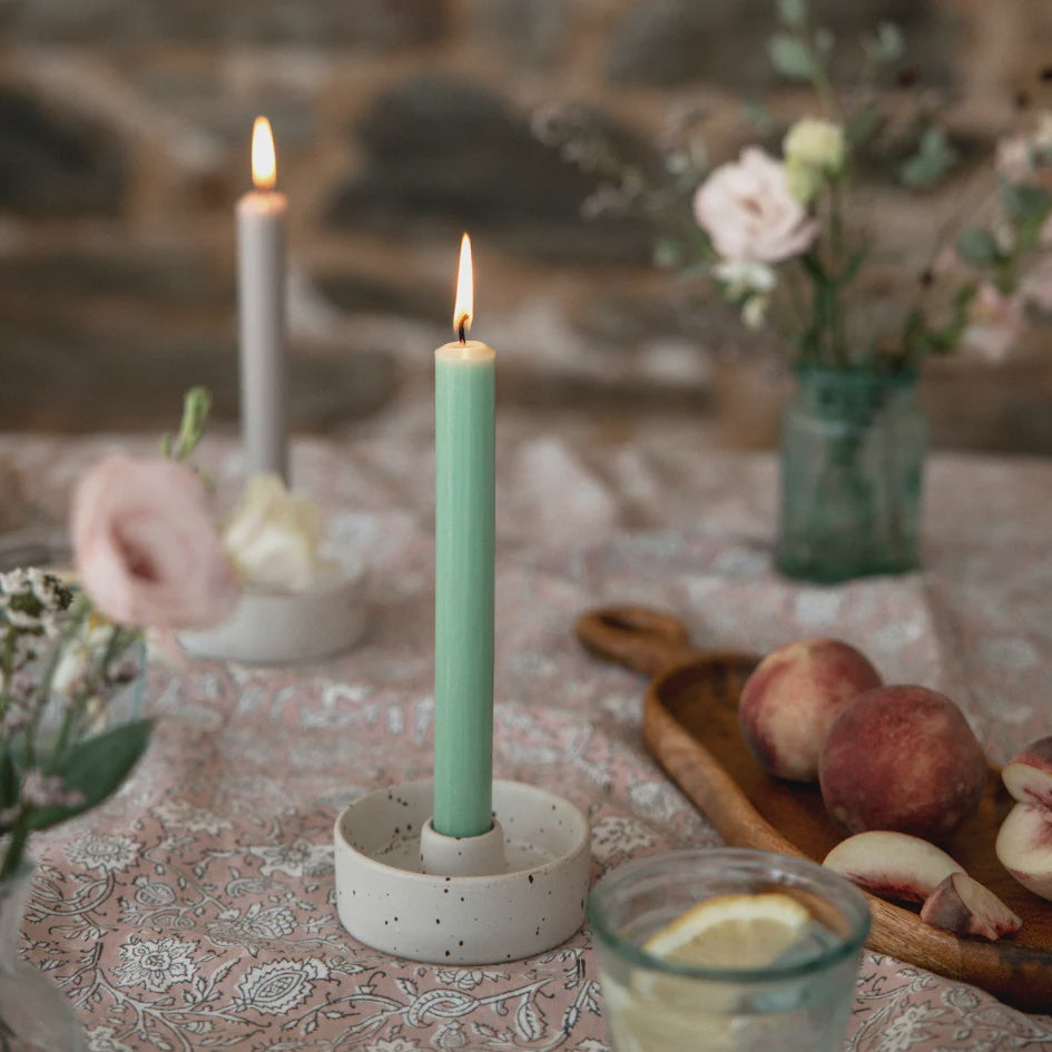Single light green dinner candle
