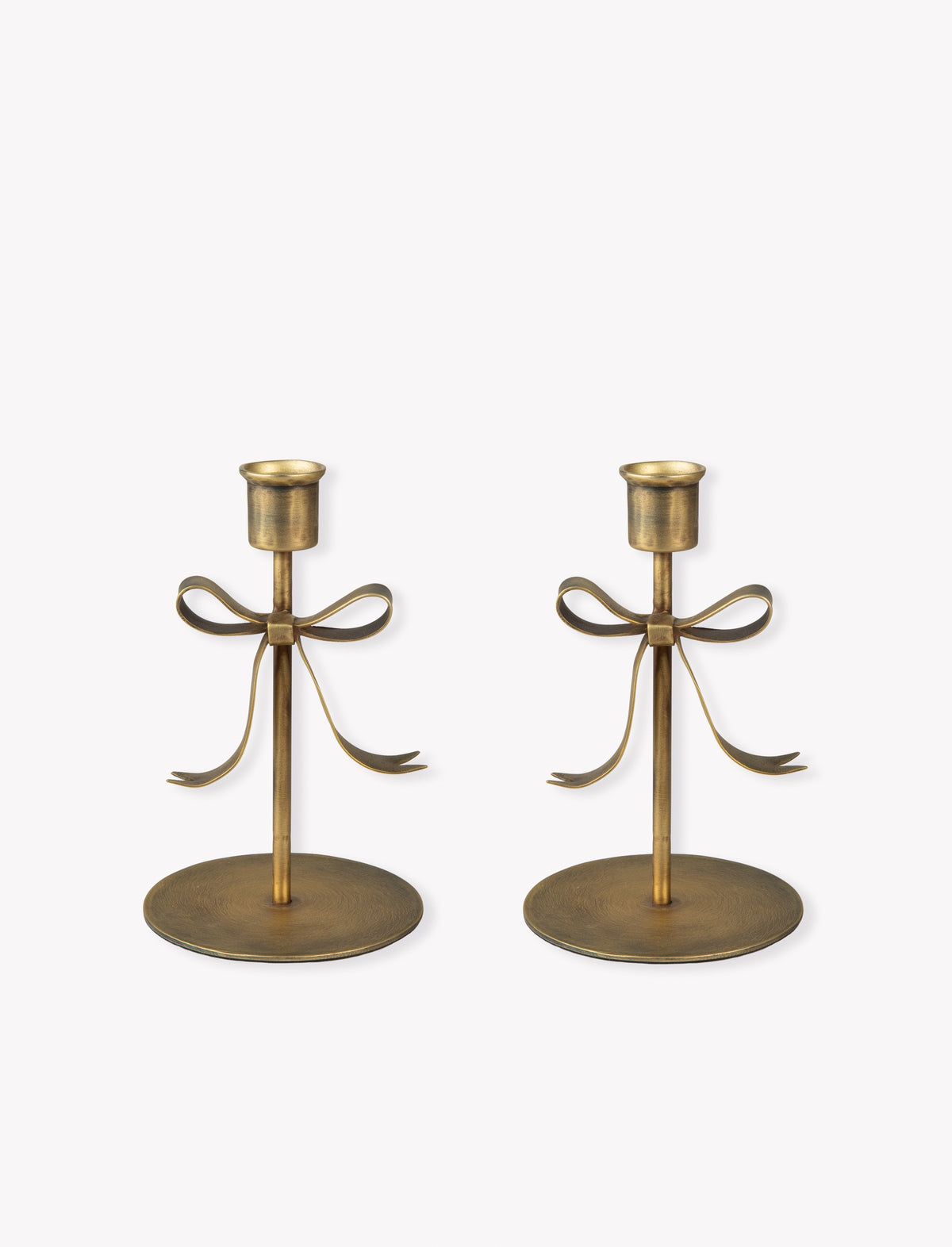 Large pair of bow candle holders