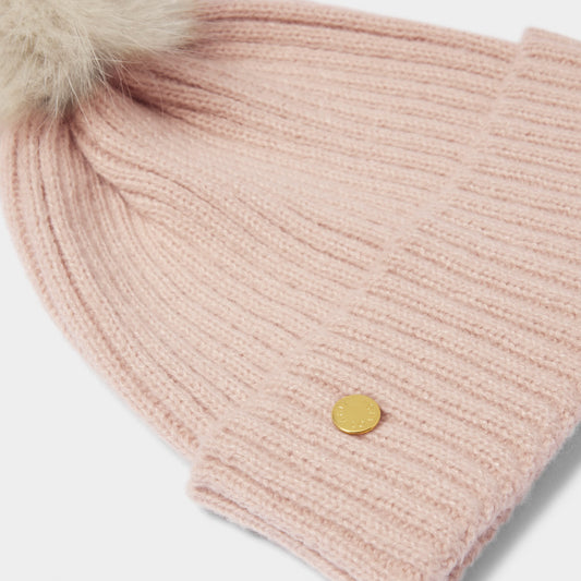 Knitted hat in pale pink